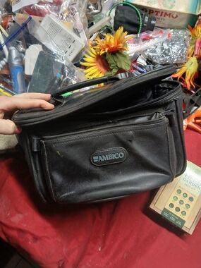 Ambico black camera bag is a vintage padded bag designed to fit cameras or camco